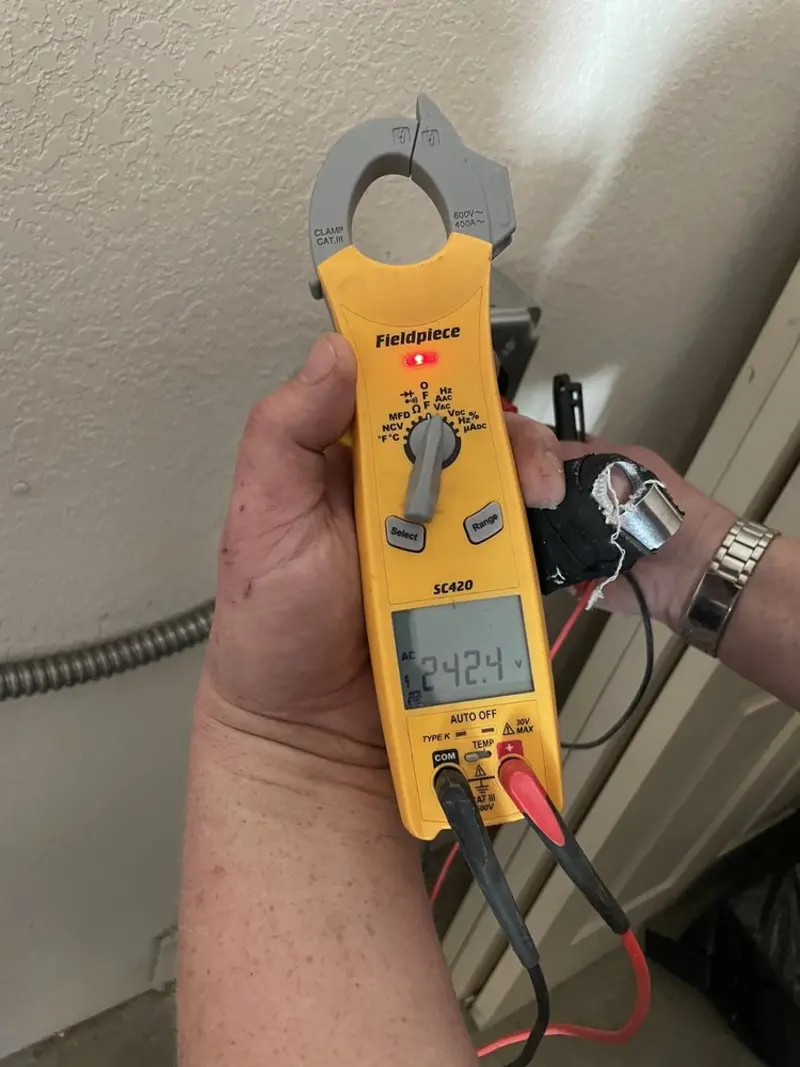 Voltage testing with clamp meter during Circuit Breaker Repair in Kingston